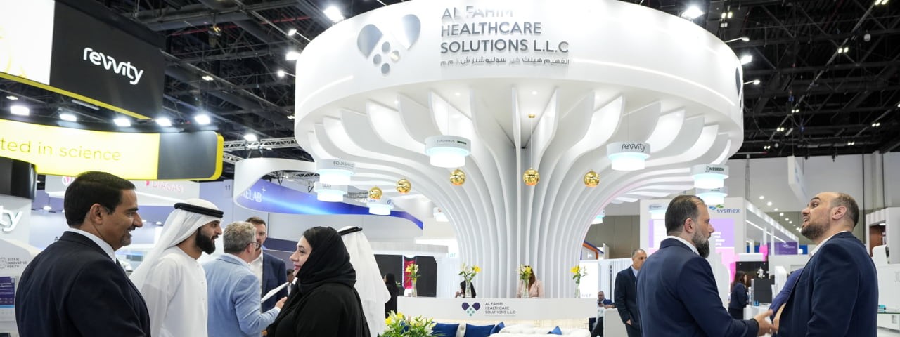 Delegates networking at a stand at WHX Labs Dubai