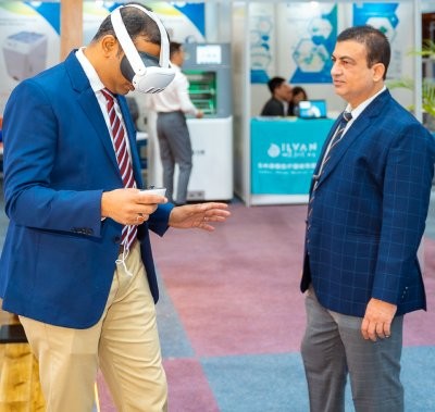 Delegate wearing a VR headset at an exhibitor's stand at World Health Expo Labs Nairobi