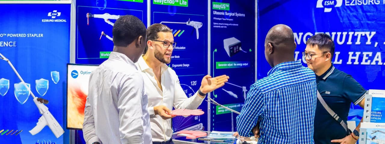 Delegates and exhibitors talking at a stand at WHX Labs Lagos.